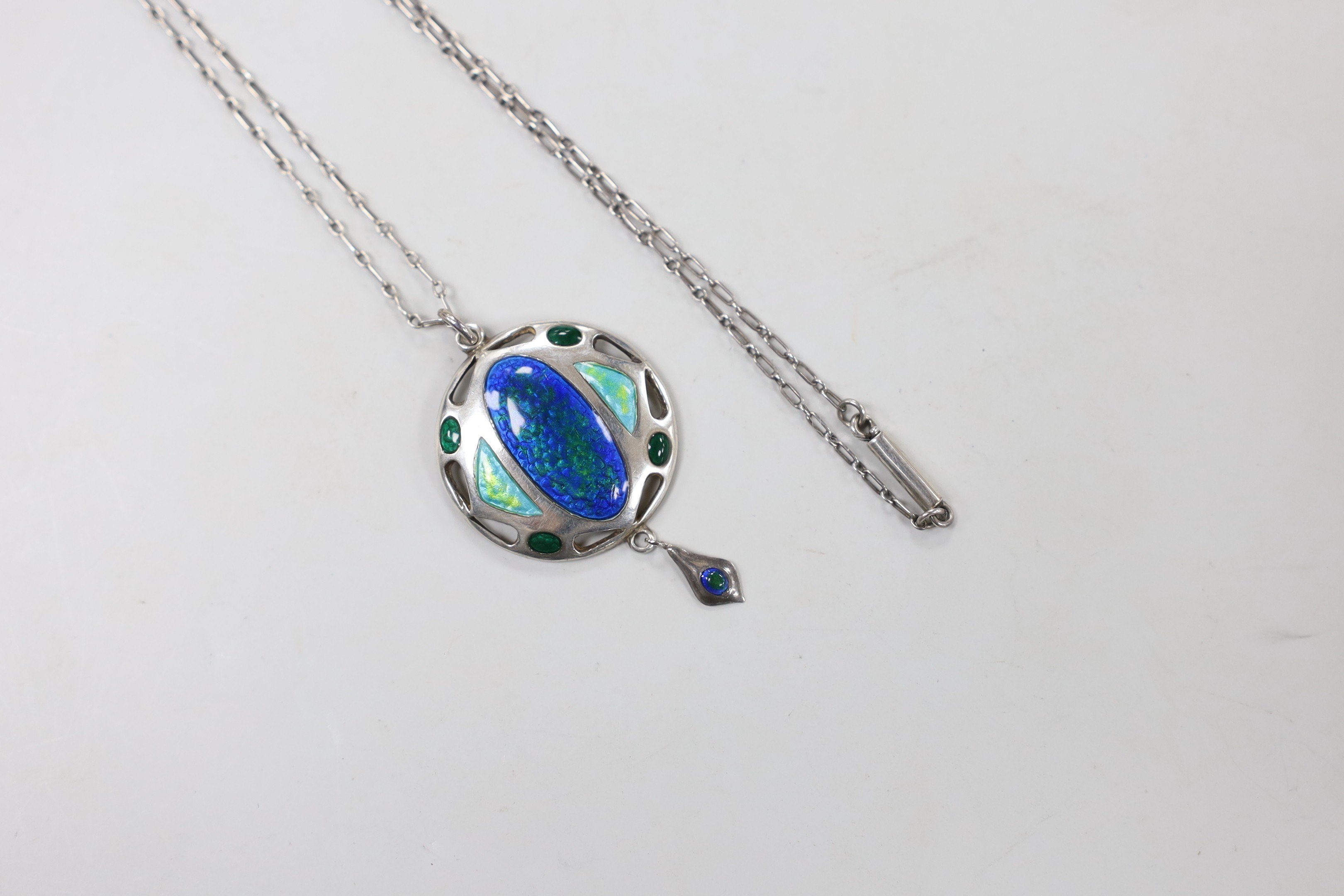 An Edwardian Art Nouveau silver and enamelled drop pendant, Smith & Ewen, Birmingham, 1909, 41mm, on a fine link chain, 42cm.